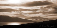 West Maui, Haleakala in a lei of clouds, and the Au`au channel seen from the Mahana area of Lana`i